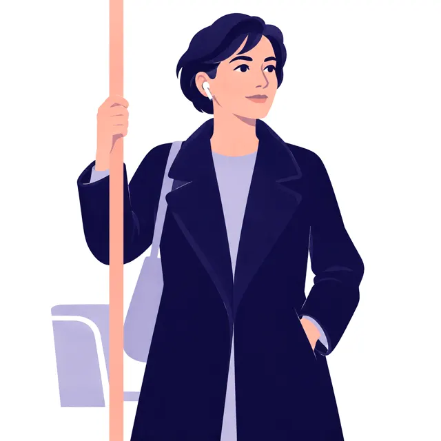Une femme écoute debout dans le métro, la main sur la barre.